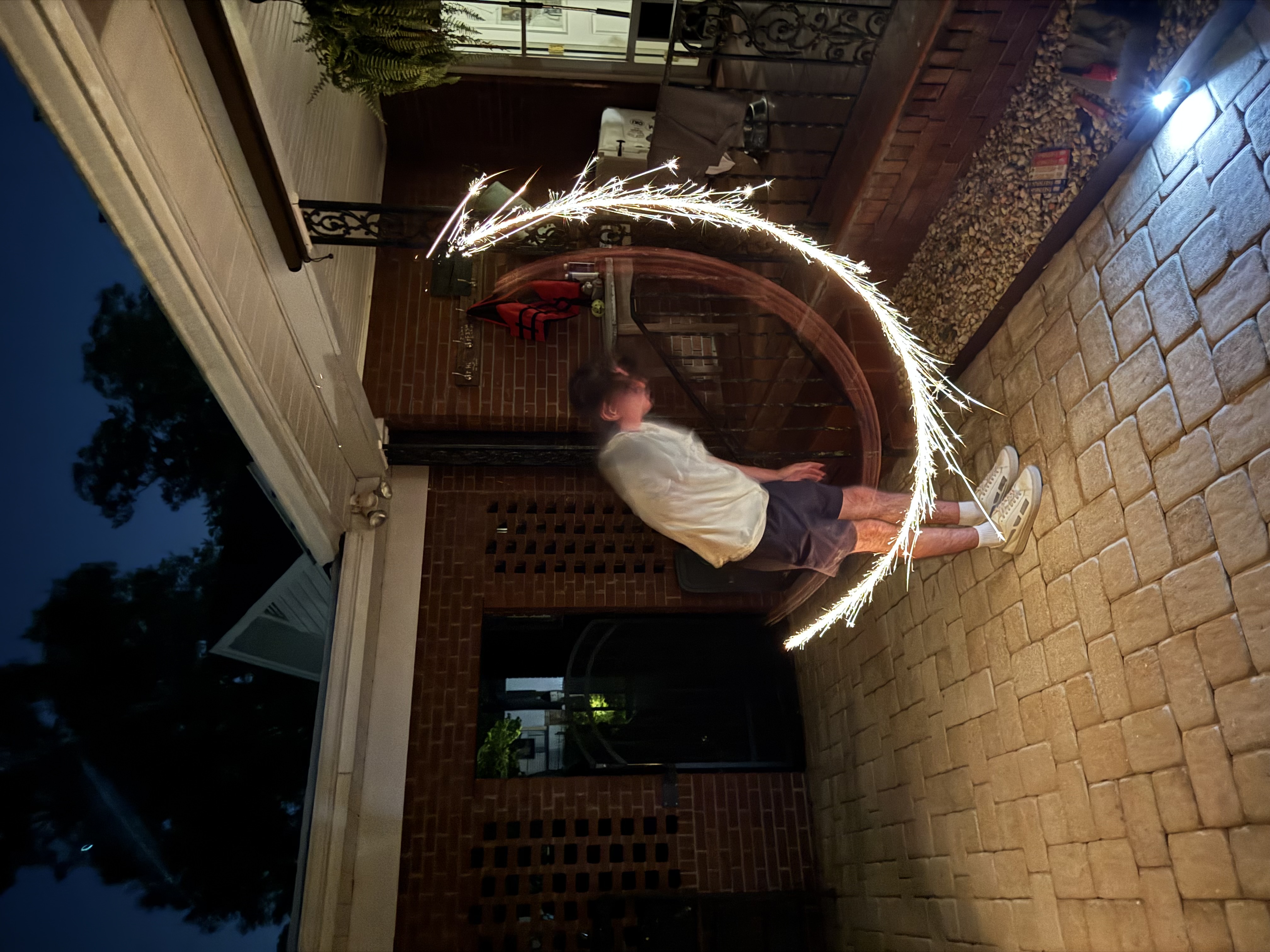 Me swinging my arm with a sparkler very fast...
